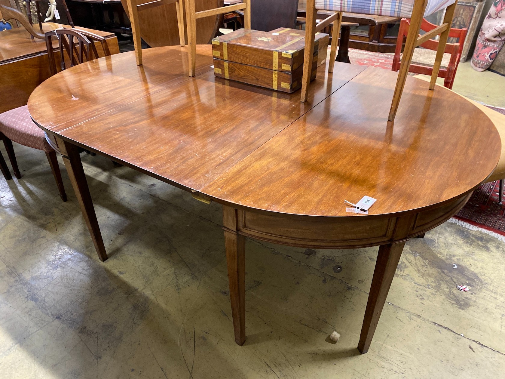 A George III D end mahogany extending dining table, length 209cm extended, one spare leaf, depth 141cm, height 74cm